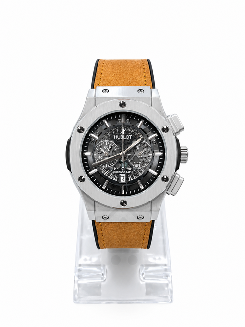 Men's silver skeleton chronograph watch with Light brown leather-style strap, black open-style dial and silver-tone case
