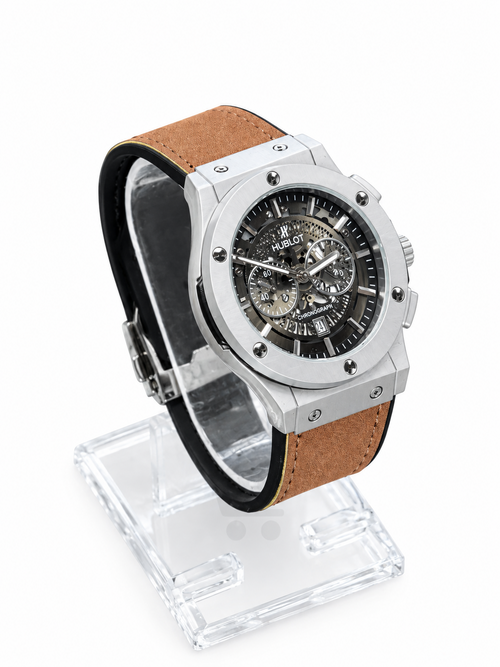 Men's silver skeleton chronograph watch with brown leather strap