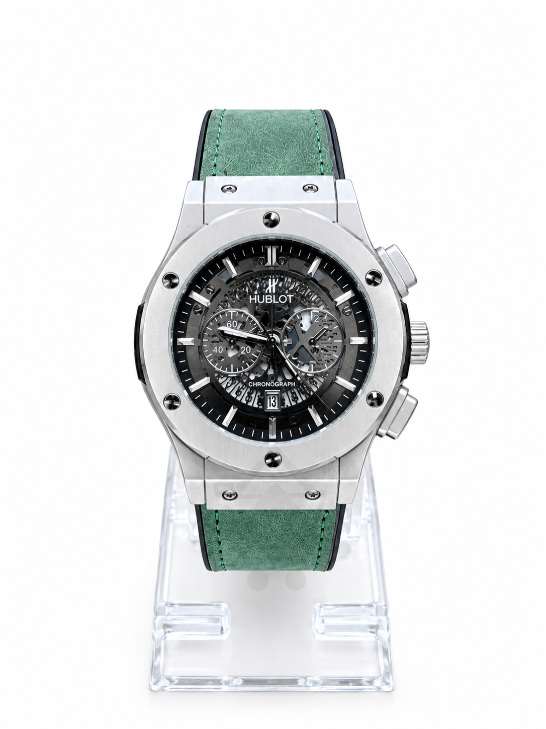 Men's silver skeleton chronograph watch with green leather-style strap and detailed black open-style dial