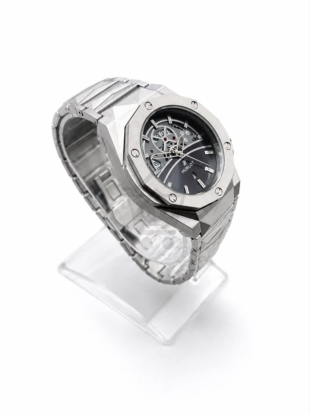 Men’s silver skeleton dial watch with stainless steel metal bracelet