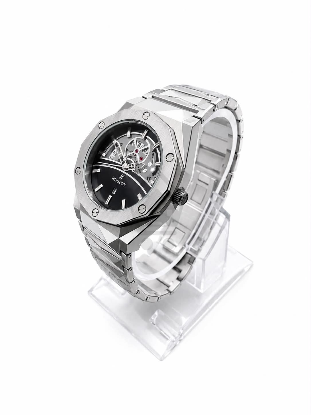 Men’s silver skeleton dial watch with stainless steel metal bracelet
